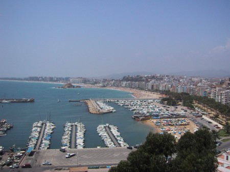 View of Blanes. The S'Abanell project is by the cliff on the west end of the beach.